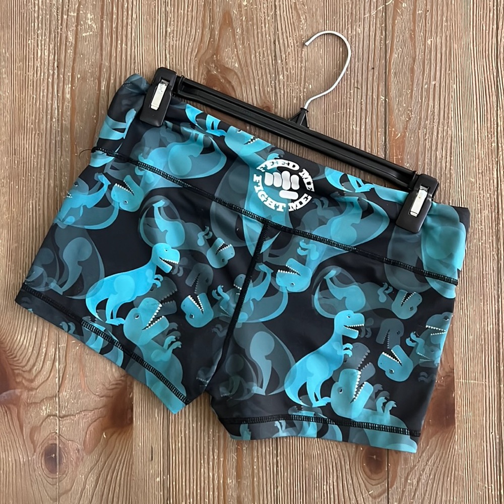 Feed me fight me dinosaur shorts